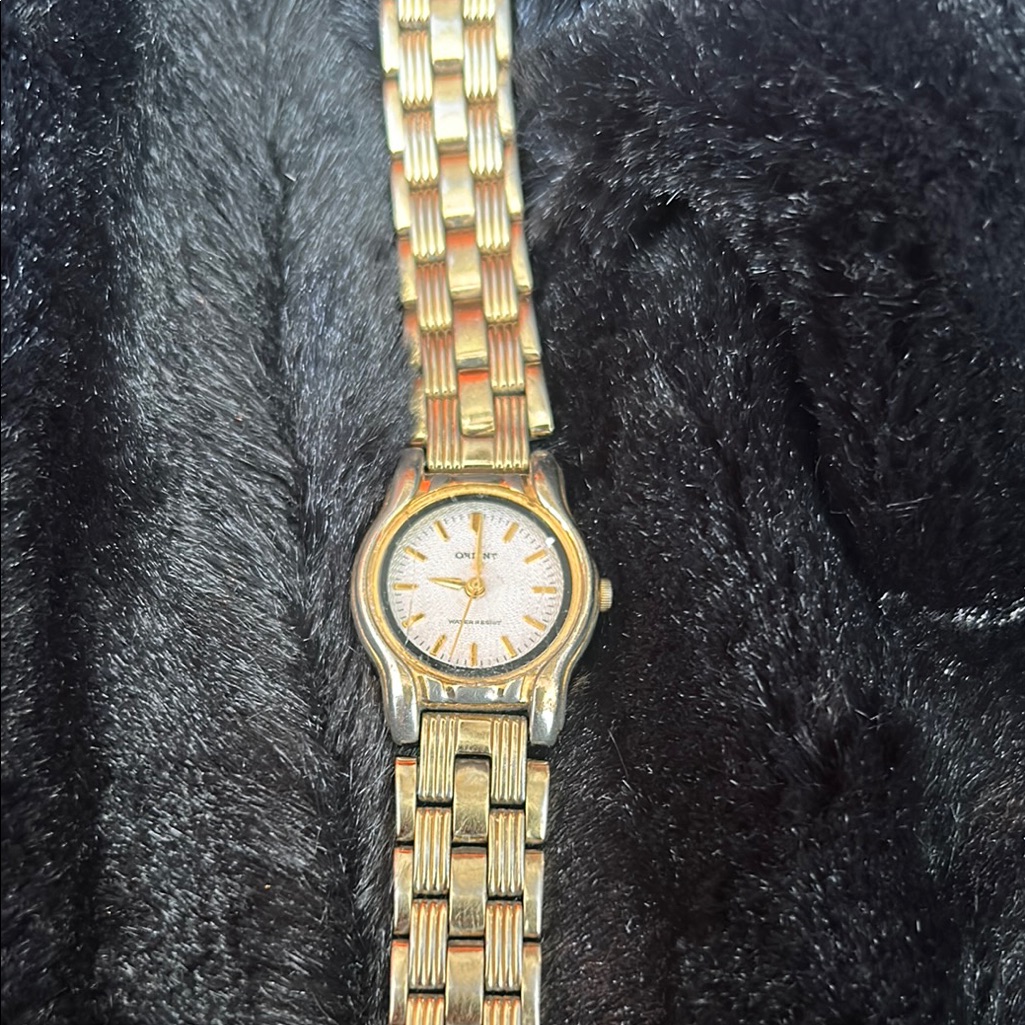 Gold And Silver Watch With White Dial